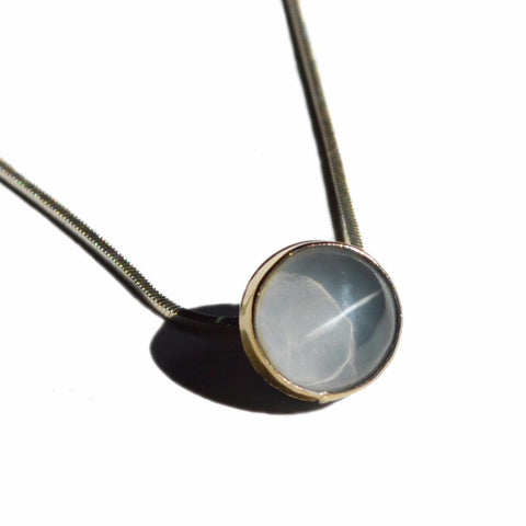 Cats Eye Crystal Quartz Orb Pendant