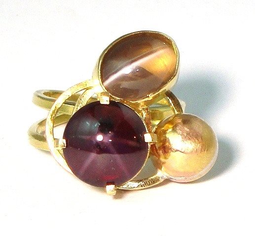 Star Eye Orbit Ring in Gold with Orbiting Phenomenal Gems