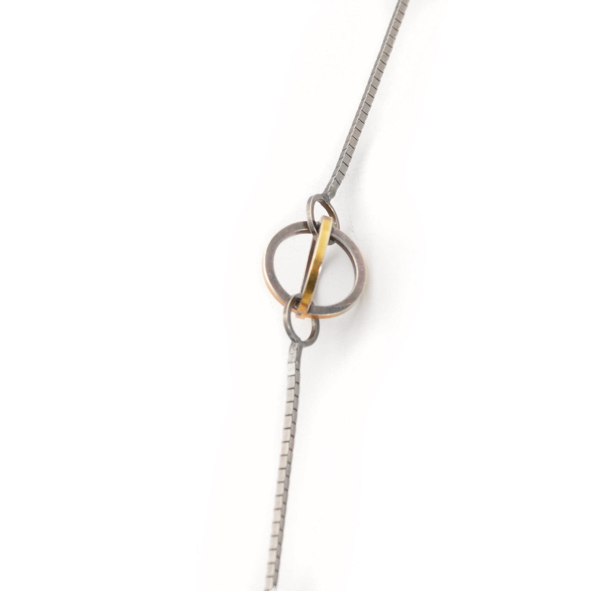 Blackened Sterling Silver and 22k Gold enhance the Geometric Shapes of this Lattis Long Necklace