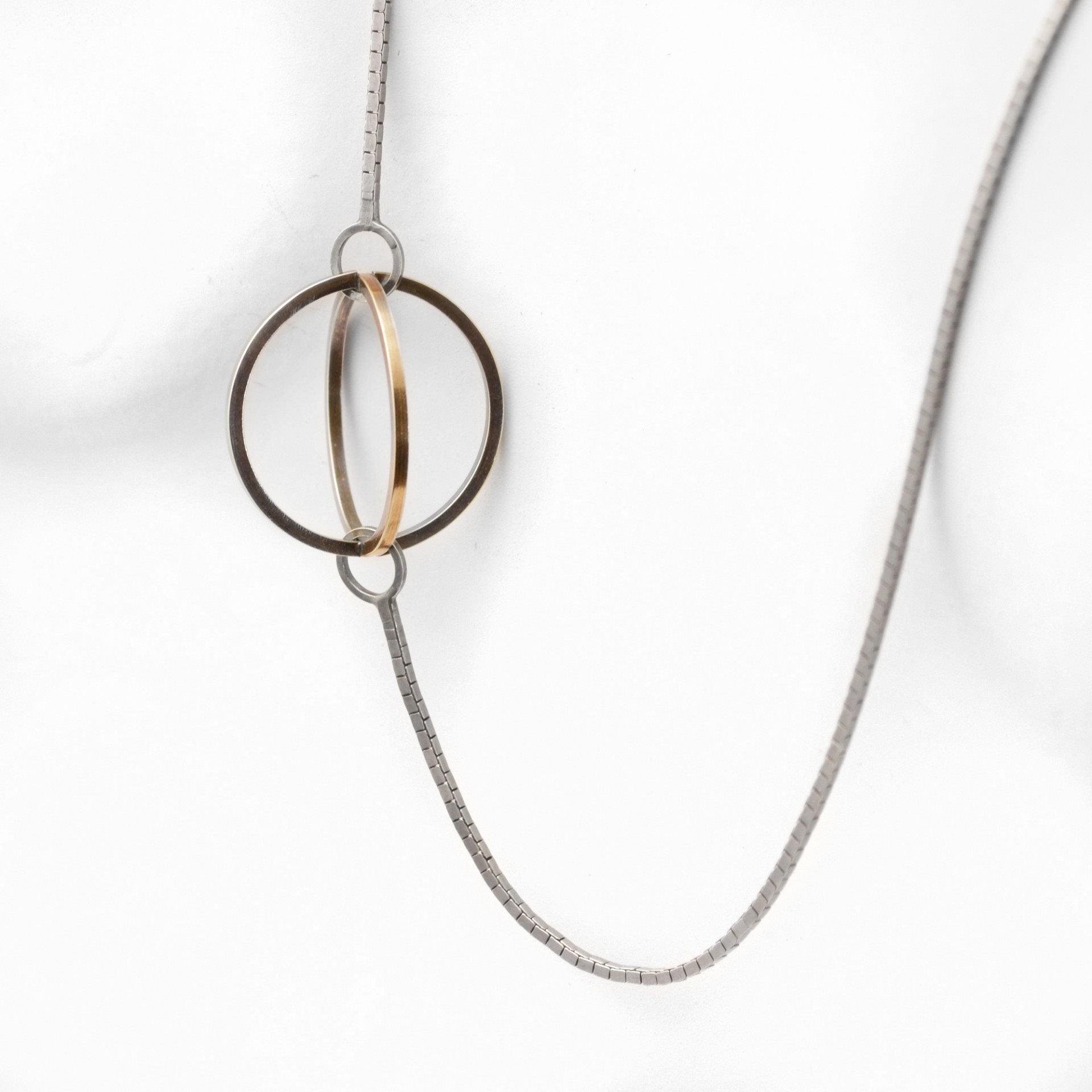 Blackened Sterling Silver and 22k Gold enhance the Geometric Shapes of this Lattis Long Necklace