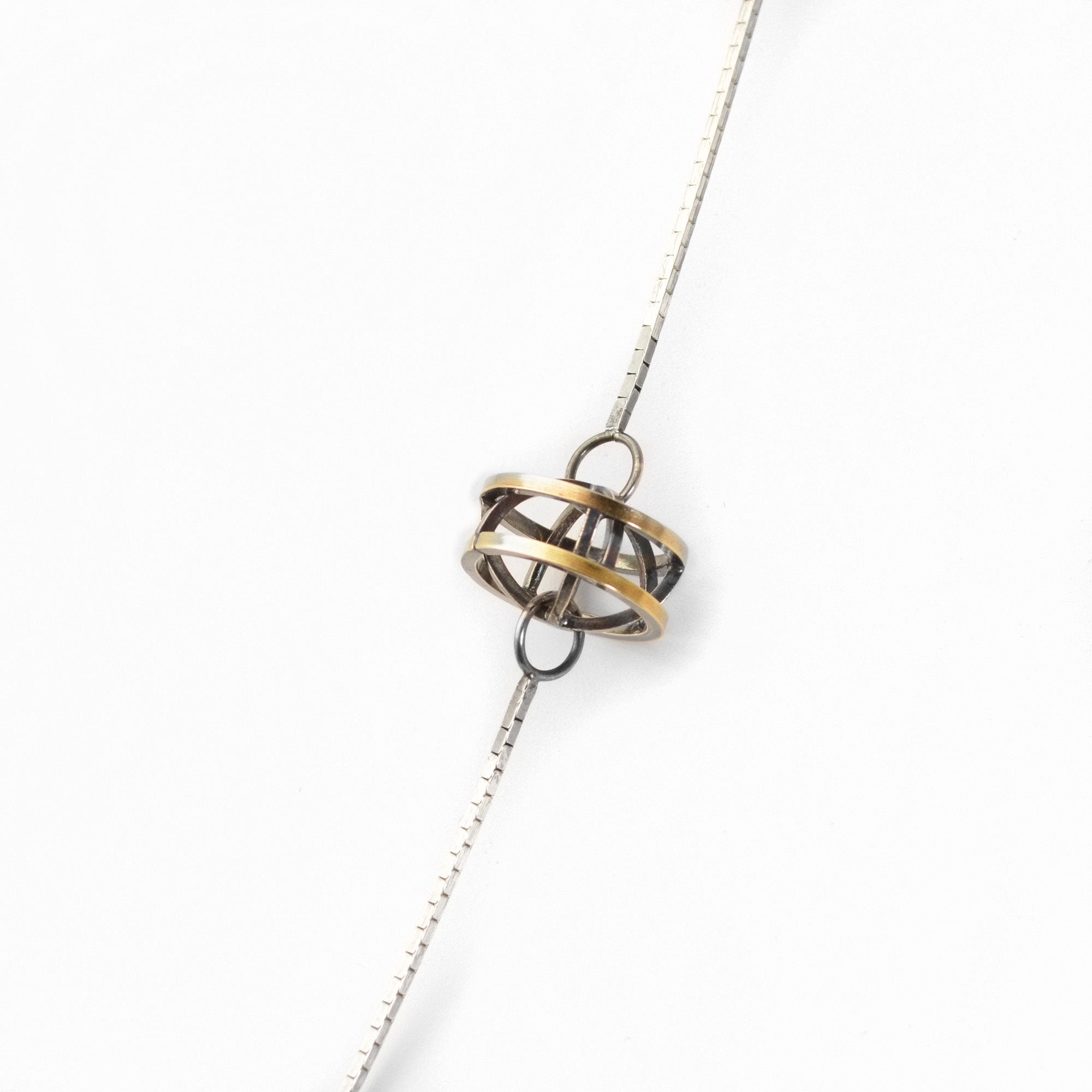 Lattis Long Necklace in Black and Gold with three Geometric Stations