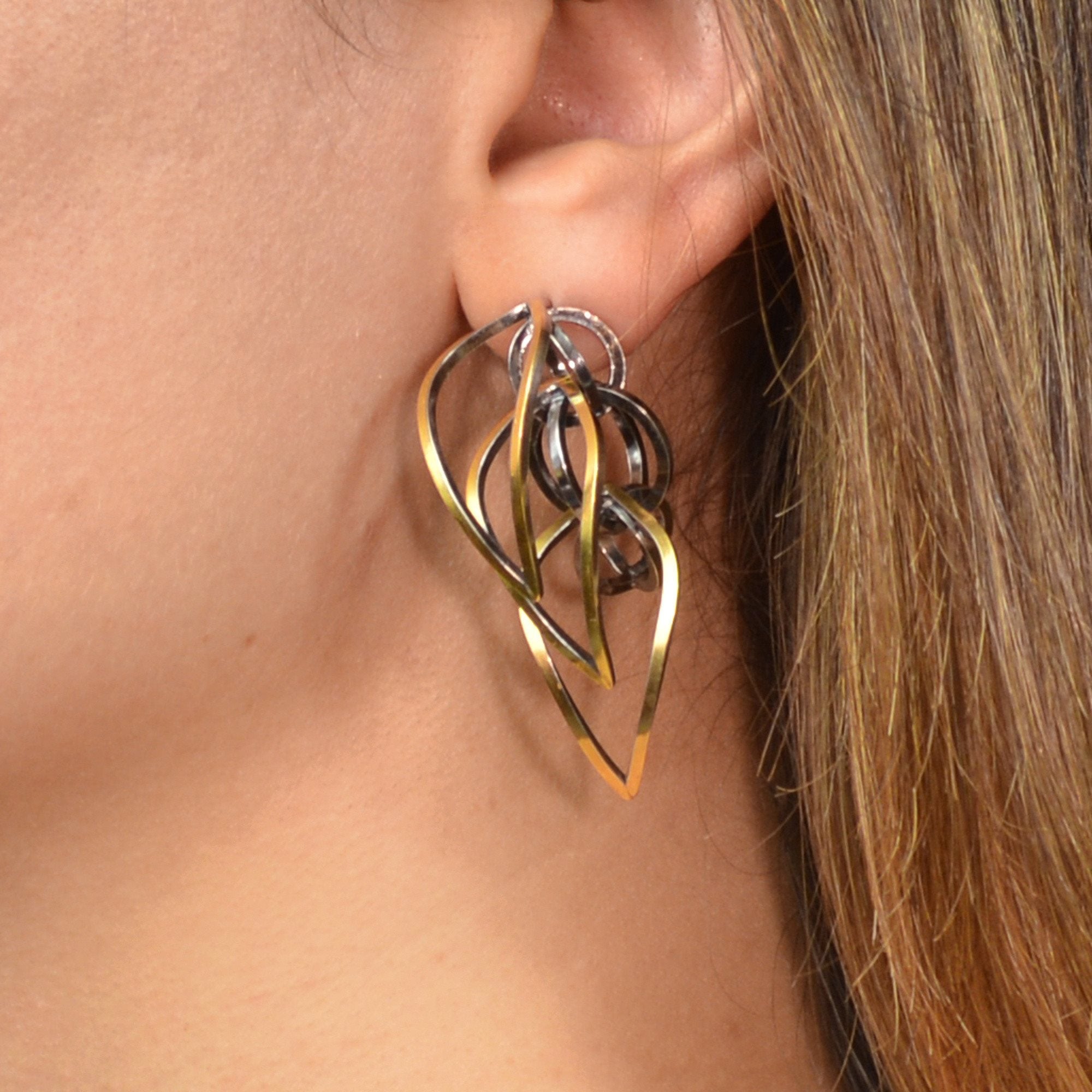 Tighra Earrings in 22k gold and Sterling Silver